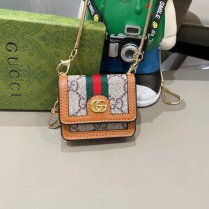 Gucci Mini Bag Charm with Signature GG Pattern